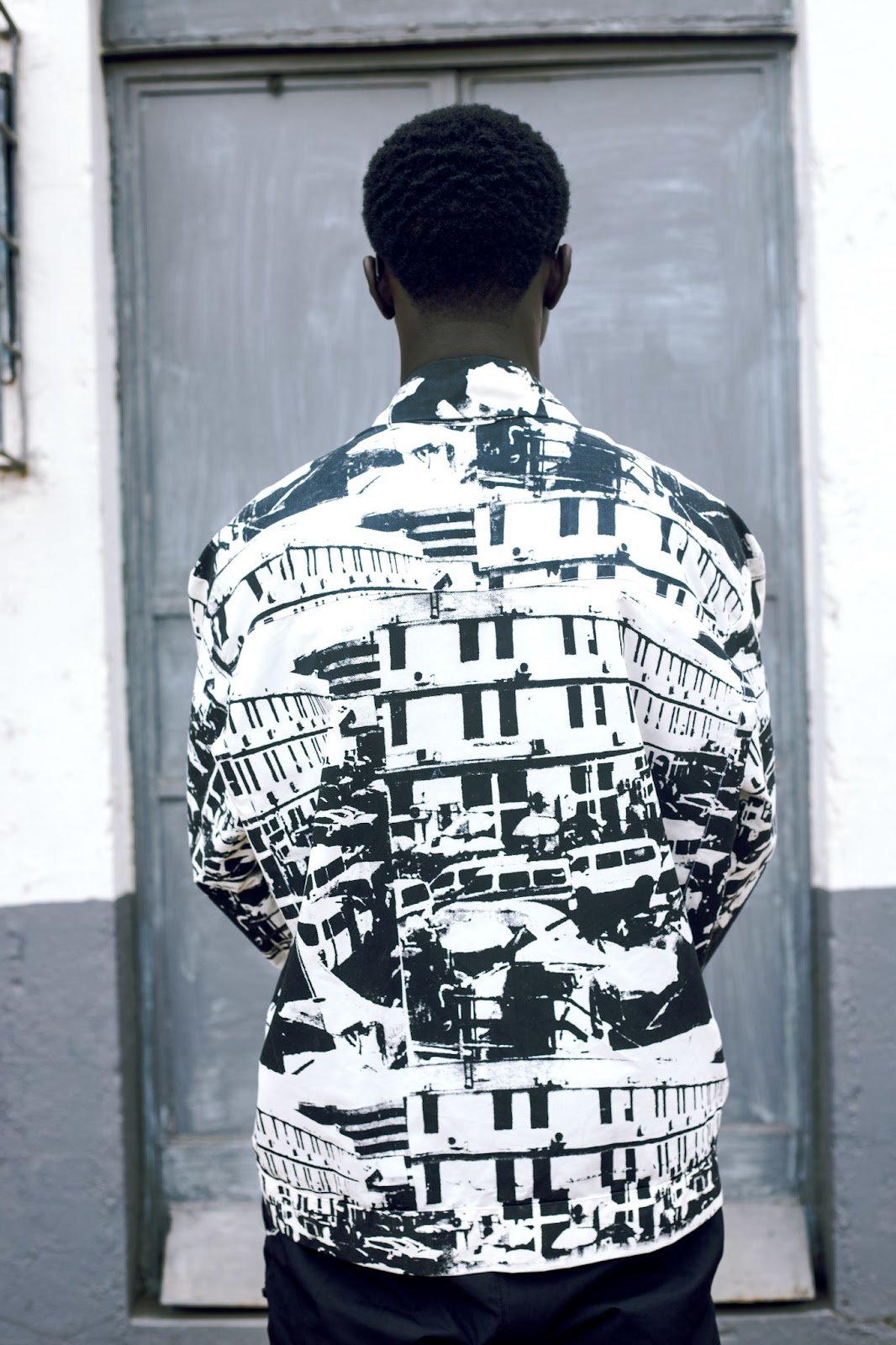 Model wearing jacket from HADORF’s Tales from the Trap collection
