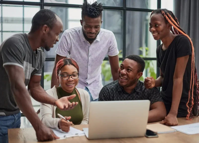 A group of creatives collaborating on a project, symbolizing teamwork, innovation, and shared vision.