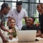 A group of creatives collaborating on a project, symbolizing teamwork, innovation, and shared vision.